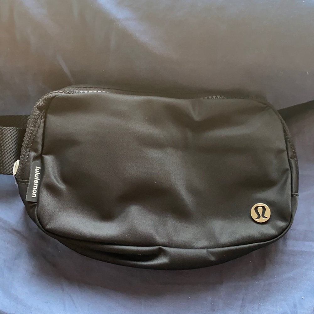 This is a brand new lululemon black belt bag.